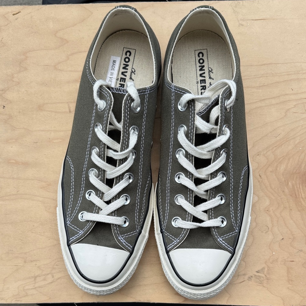 Converse Chuck Taylor - Army Green - Never Worn.  
8 men’s; 10 women’s.